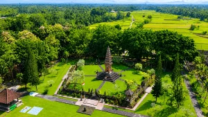 A stunning bird’s-eye view of Margarana Memorial Park showcasing the central monument, symmetrical pathways, and expansive green landscape that honors Bali’s independence heroes.