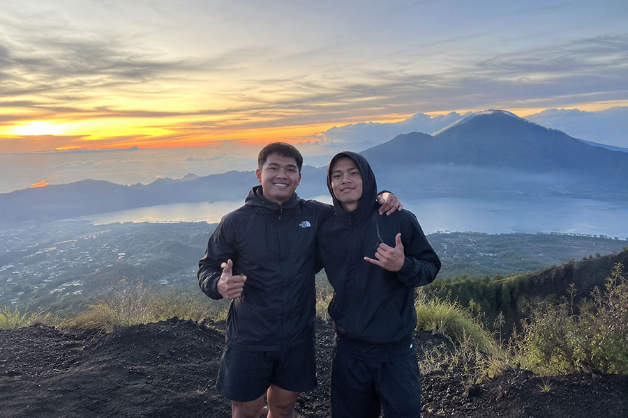 Hikers on a trail through lush jungle in Bali | balitouristic.com