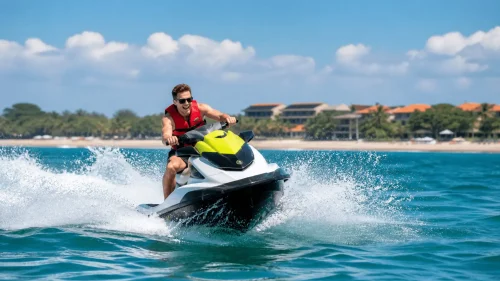 Exciting jet ski Seminyak experience with a rider speeding across clear blue waters on a sunny day in Bali.