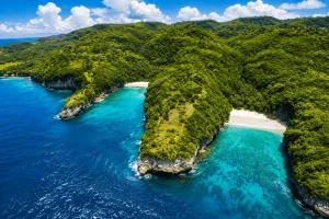 A breathtaking view of Pandan Beach featuring crystal-clear turquoise waters, white sandy shores, dramatic cliffs, and a peaceful hidden paradise atmosphere perfect for tropical island adventures.
