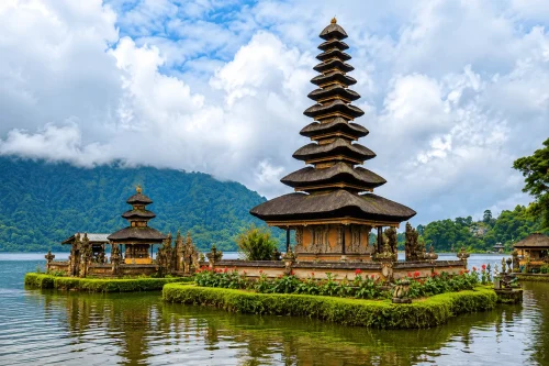 A serene view of Pura Ulun Danu Beratan surrounded by calm lake waters and misty mountain landscapes, showcasing one of the hidden temples in Bali with iconic Balinese architecture and a peaceful spiritual atmosphere.
