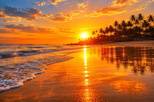 seseh beach - badung interesting places to visit - bali touristic A breathtaking sunset view at Seseh Beach featuring glowing orange skies, dramatic ocean waves, black sand shores, and a peaceful tropical coastal atmosphere at dusk.