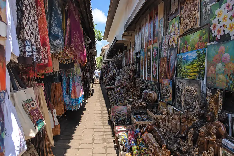 A traditional souvenir and handicraft shop packed with Balinese art pieces inside sukawati art market. | balitouristic.com