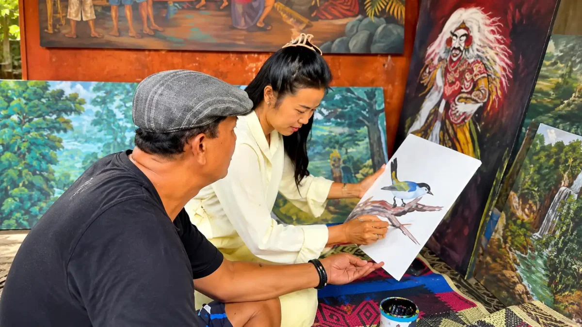 Students learning traditional Balinese painting and sculpting at Batuan Painting and Sculpting School in Bali.