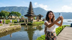 Modern travelers sharing Bali experiences on social media while discovering the island’s cultural and natural attractions.