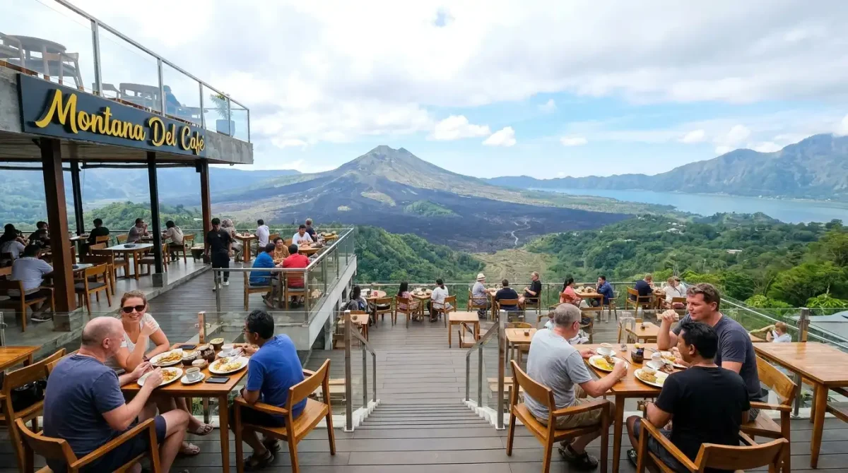 A stylish cafes in Kintamani Bali setting at Montana Del Cafe featuring modern outdoor seating, freshly brewed coffee, panoramic views of Mount Batur and Lake Batur, lush highland scenery, and visitors enjoying the cool mountain atmosphere in Bali.