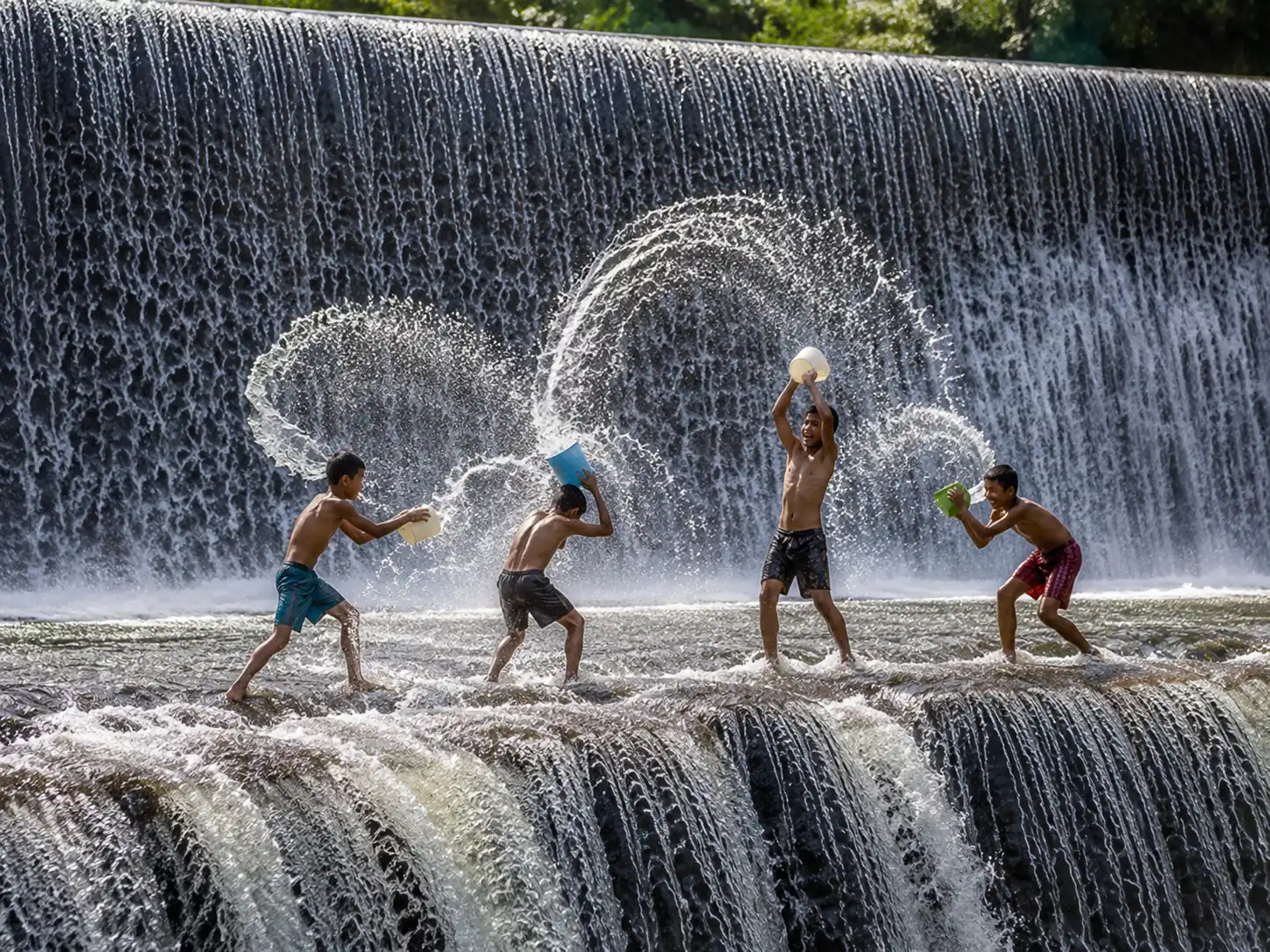 playing in the water at tukat unda, Bali