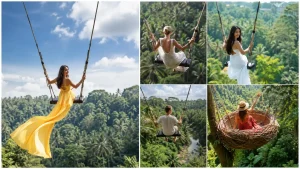 Tourists enjoying giant swings above lush tropical valleys as part of a Bali swing package.