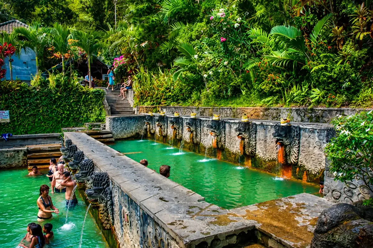 Visitors relaxing in the natural thermal pools at Banjar Hot Springs in North Bali.