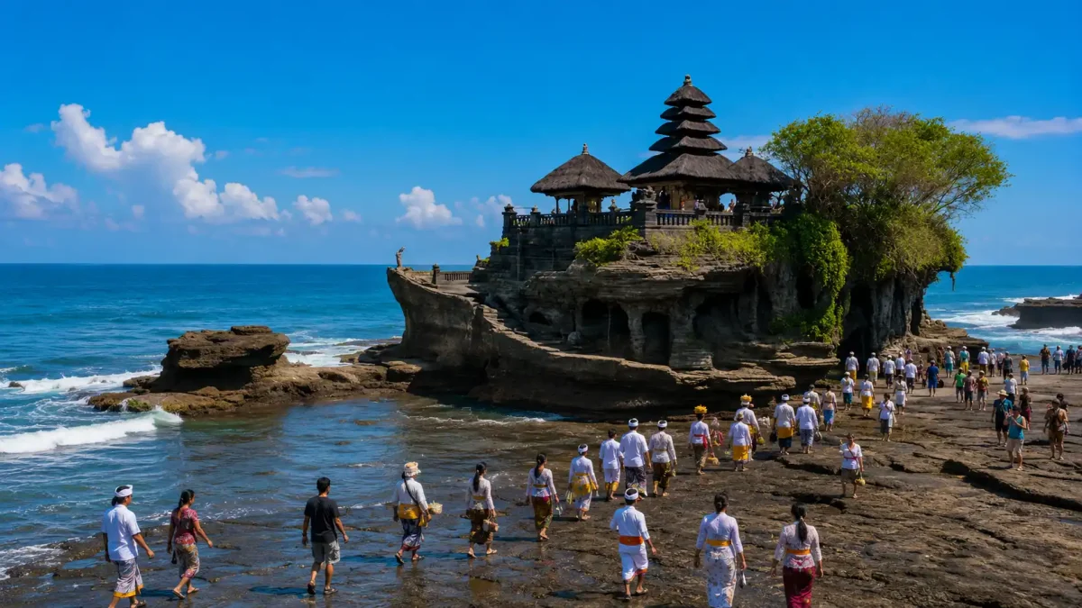 4 day Bali itinerary : Ancient Tanah Lot Temple standing on a rocky offshore outcrop at sunset in Bali.