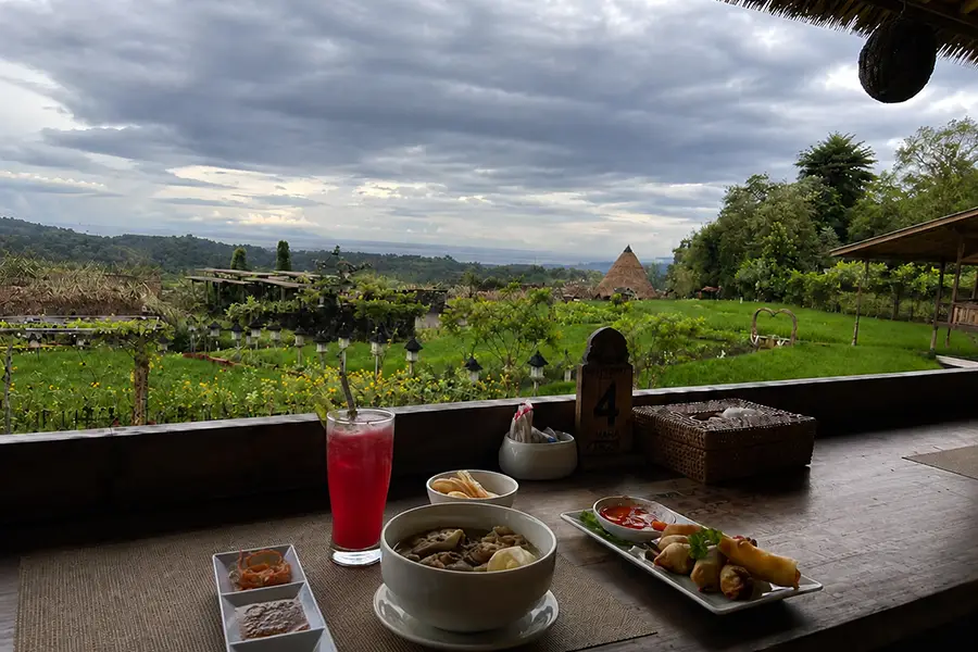Food and drinks served with a scenic outdoor valley view at Maha Gangga Valley.