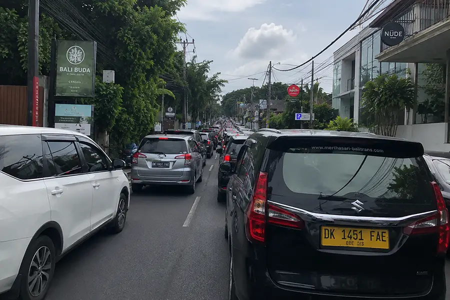 Heavy car traffic along the main route from Canggu to Uluwatu.