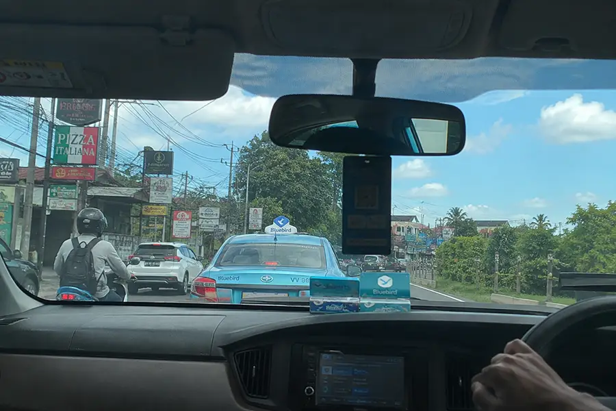 View from inside a car taking a taxi from Ungasan to Uluwatu.