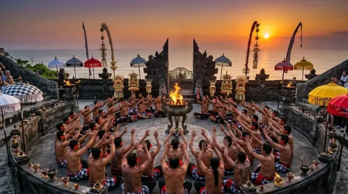 Kecak Fire Dance performance at sunset after traveling from Seminyak to Uluwatu.