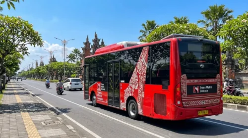 Red Trans Metro Dewata bus option for a budget Bali airport transfer to Sanur.